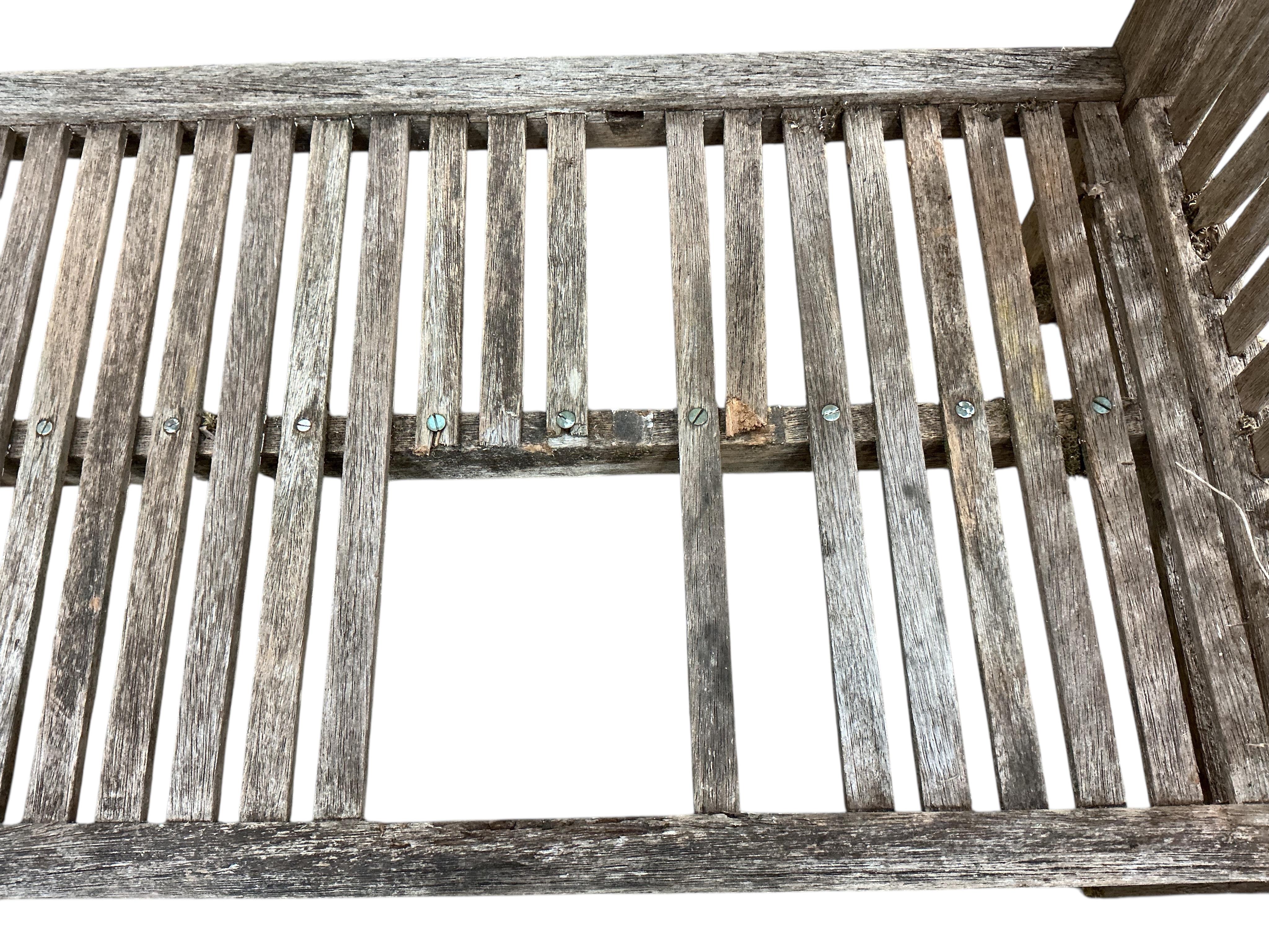 A Heals weathered teak garden bench, width 114cm, depth 56cm, height 84cm